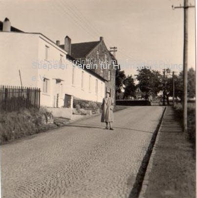 Blick von der Surkenstraße 1944, mit Haushaltswarengeschäft Kestermann